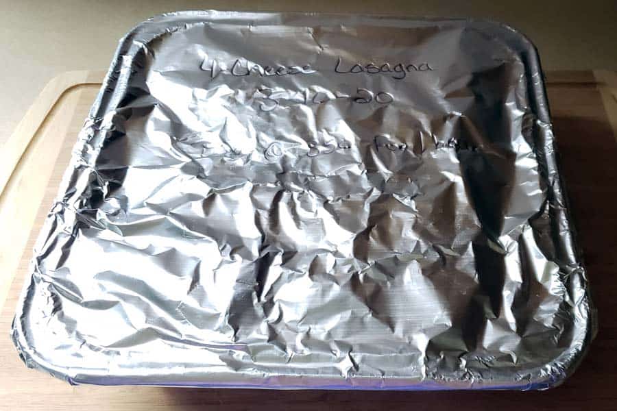 Foil wrapped pan of lasagna
